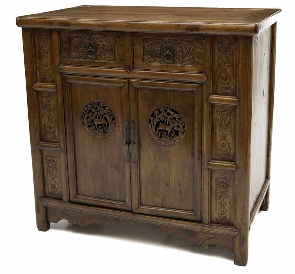Three quarter perspective view of 19th century Chinese wedding cabinet with open and relief carving of deer and flowers only at Humble House gallery Canberra