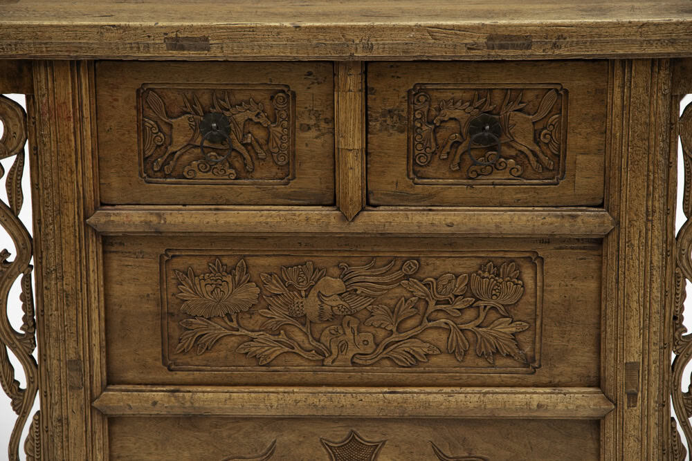 19th century Chinese two drawer coffer - detail showing the flying horse above the phoenix and peony