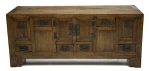 Early 20th century Chinese softwood low cabinet with original bat-shaped fittings and hardware.