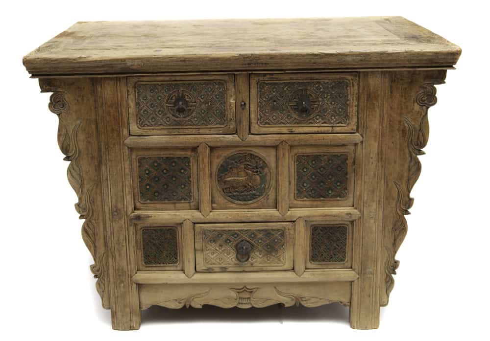 Ornate carved Chinese elmwood coffer with multiple drawers, antique furniture piece from the 18th century.